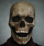 Grey skull mask with articulated open mouth for expressive Halloween wear.