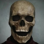 Grey skull mask with articulated open mouth for expressive Halloween wear.