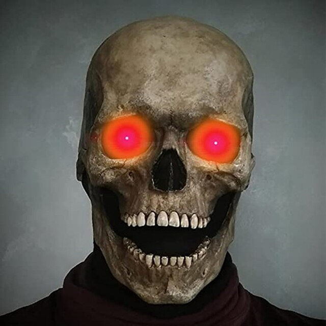 Skull mask featuring menacing red eyes for realistic horror costume.