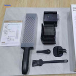 Slicora black kit contents show lever, cutting blades, and all replacement parts included.