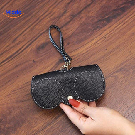 Compact leather glasses case displayed as protective eyewear storage solution.