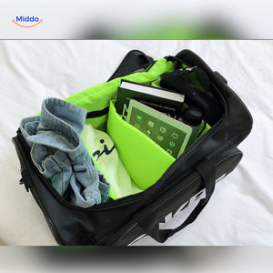 SNKRPro sports bag with green interior compartment filled with clothing.