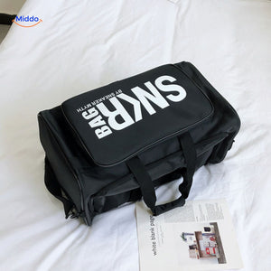 SNKRPro black sports bag full view with subtle text design.