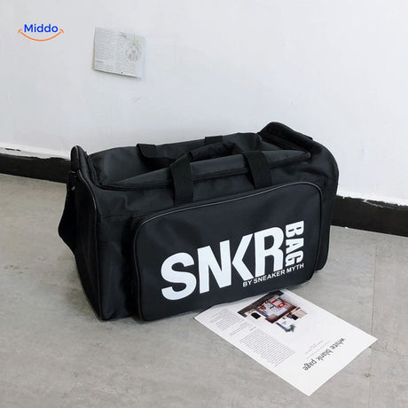 SNKRPro sports bag close-up with prominent white text branding detail.