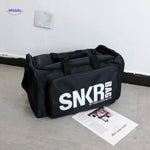 SNKRPro sports bag close-up with prominent white text branding detail.