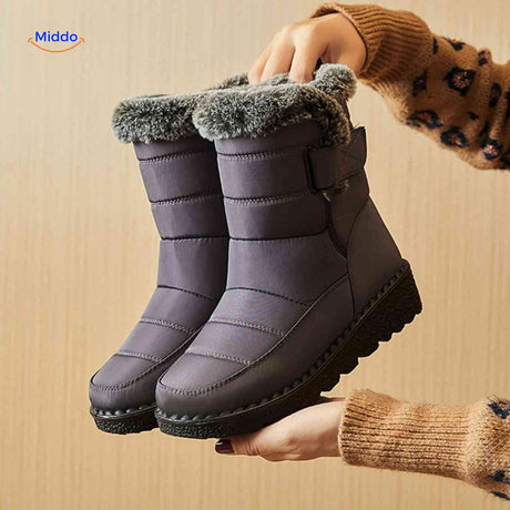 Grey SnowLuxe boots with fur lining providing maximum cozy comfort for winter.