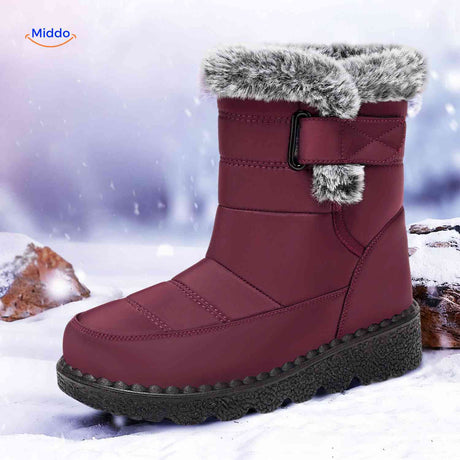 Red SnowLuxe snow boots featuring fur lining and warm insulation for cold days.
