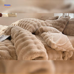 Cozy beige plush rabbit fur duvet cover set on bed.