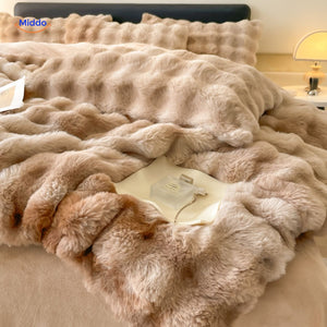Beige plush duvet with dark blankets and faux rabbit fur finish.
