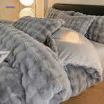 Gray plush rabbit fur duvet cover set in light bedroom.