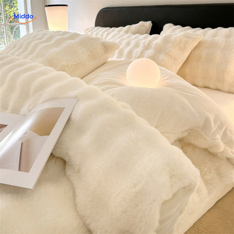 Soft white plush rabbit fur bedding set.