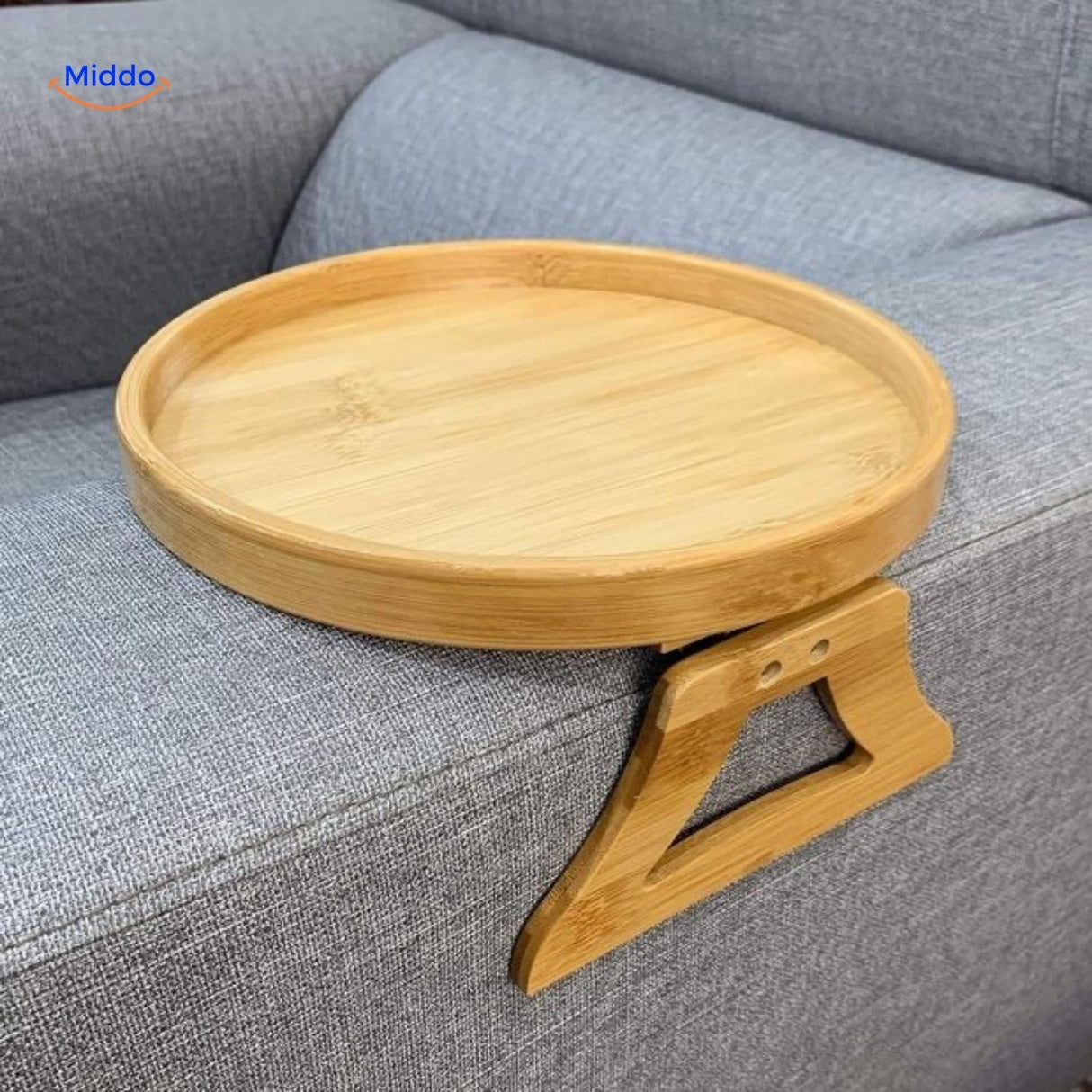 ComfyGrip sofa armrest tray with empty bamboo leaf surface ready for snacks and drinks.