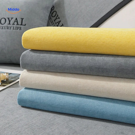 Multiple CheniLux sofa cover colors stacked together, showing full palette of available options.