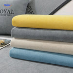 Multiple CheniLux sofa cover colors stacked together, showing full palette of available options.