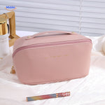 Soft pink travel makeup pouch for essentials