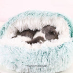 Warm SoftSnuggle pet bed in green color for dogs and cats comfort.