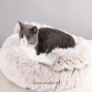 Comfortable SoftSnuggle pet bed in light brown for dogs and cats.