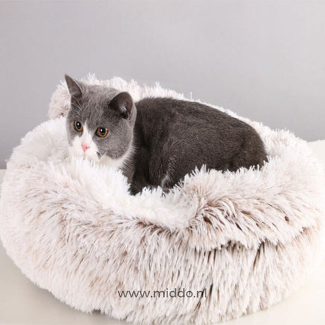 Comfortable SoftSnuggle pet bed in light brown for dogs and cats.