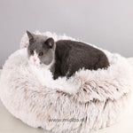 Comfortable SoftSnuggle pet bed in light brown for dogs and cats.