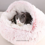 Soft round-shaped SoftSnuggle pet bed in pink for dogs and cats.