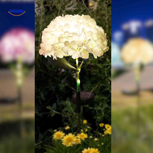 White hydrangea solar garden lamp with automatic dusk-to-dawn operation.