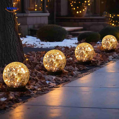 Solar garden lighting along driveway and winter garden setting.