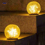 Solvion solar lamp providing warm LED glow on outdoor stairs.