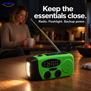Green SolarPower Pro radio with its flashlight on, sitting on a kitchen counter during a power outage