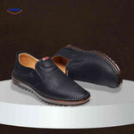 Black Solura loafers blending casual fashion with slip-on comfort.