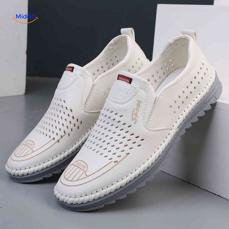 White breathable Solura loafers side view showing comfortable slip-on fit.