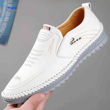 White leather Solura loafers offering slip-on comfort for casual men's style.