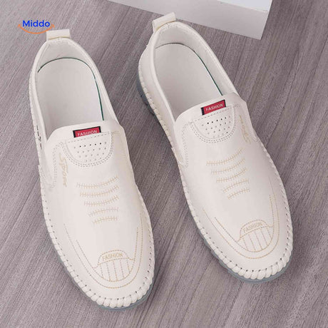 White trendy Solura loafers offering comfortable slip-on style for men.