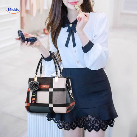 Spacious tote handbag styled with outfit, perfect for everyday carry.