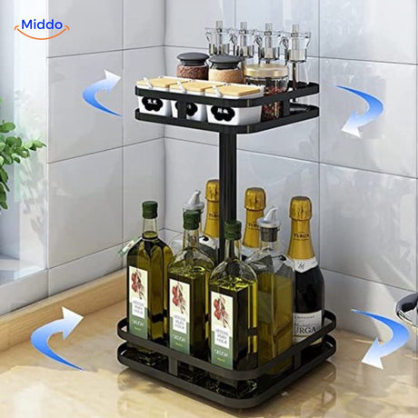 Kitchen rotatable storage rack in brushed metal finish organizing spices and cooking essentials.