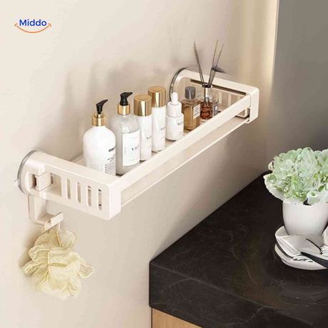 Empty stainless steel suction shelf with hook attachment point.