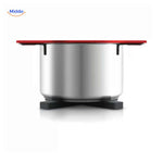 Stainless steel cookware resting on heat-resistant wooden trivet for safe kitchen use.