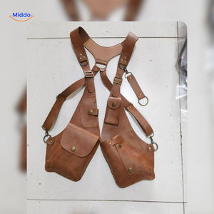 Light brown leather steampunk shoulder holster bag in studio setting.
