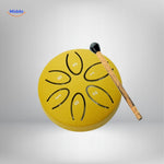 Yellow steel tongue drum with numbered notes and beater for playing.
