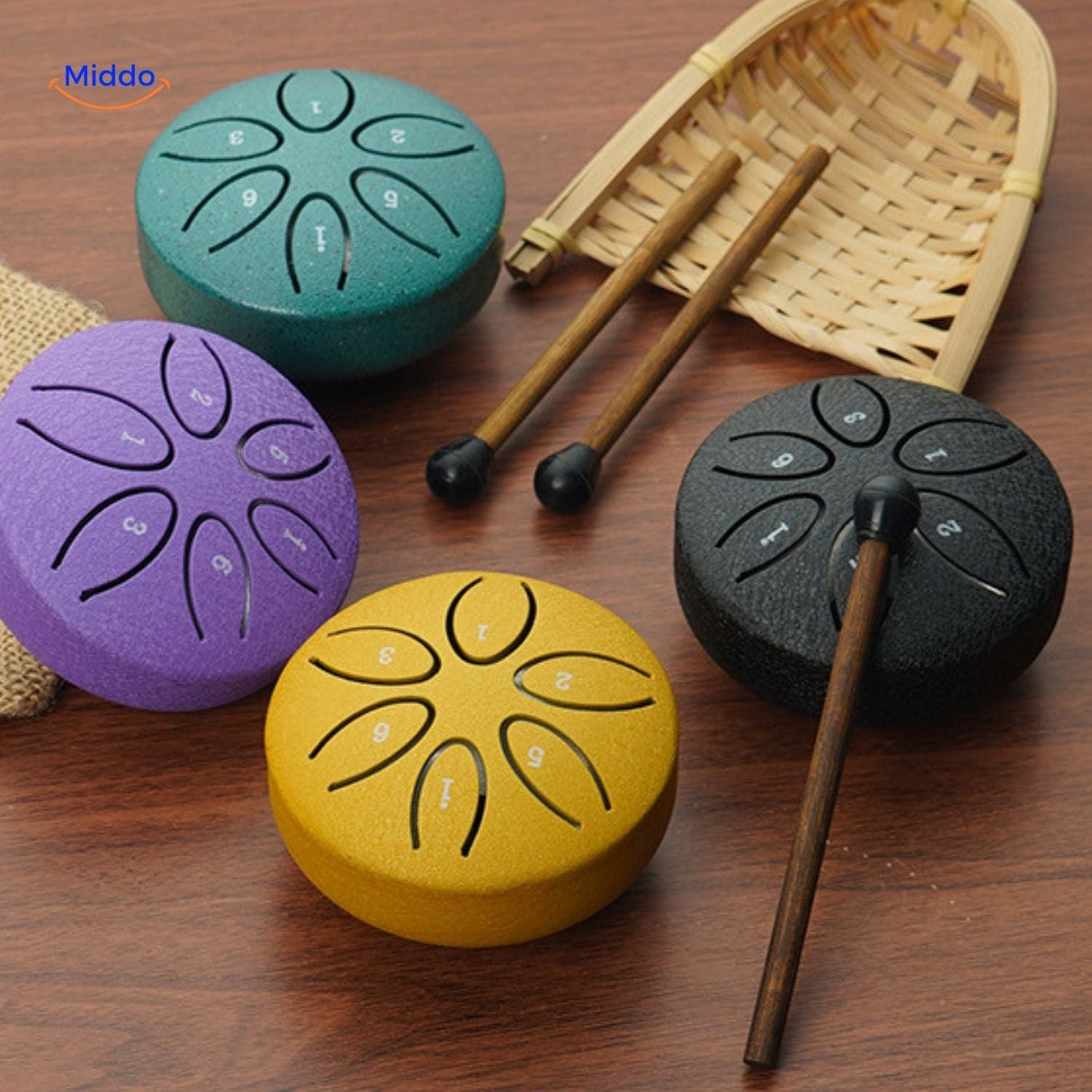 Steel tongue drum with matching mallets and beaters accessories set.