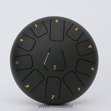 Black 20cm steel tongue drum handpan instrument.