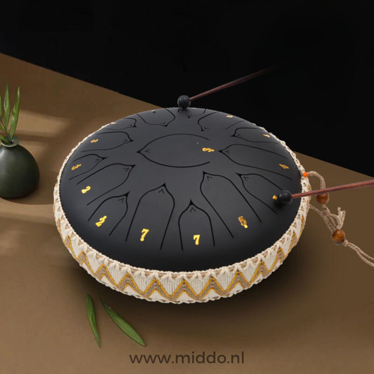 Black 33cm steel tongue drum handpan instrument.