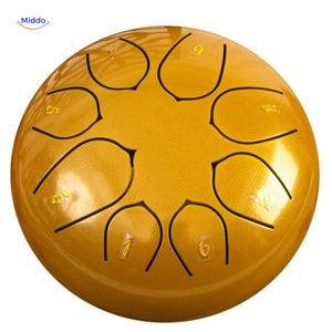Gold steel tongue drum premium metallic finish luxury meditation tool.