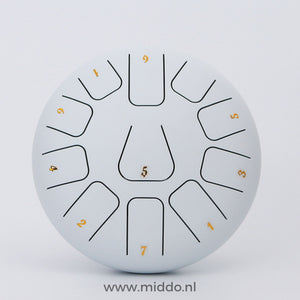 White 20-25cm steel tongue drum handpan instrument.