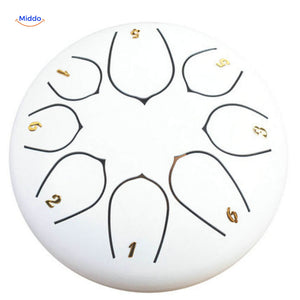 Elegant white steel tongue drum meditation instrument for peaceful soundscapes.