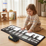 Child playing on electronic piano dance mat for active learning
