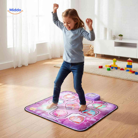 Girl dancing and playing on interactive musical dance mat