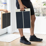Portable stretch board with easy-grip handle for transport and convenient home storage.