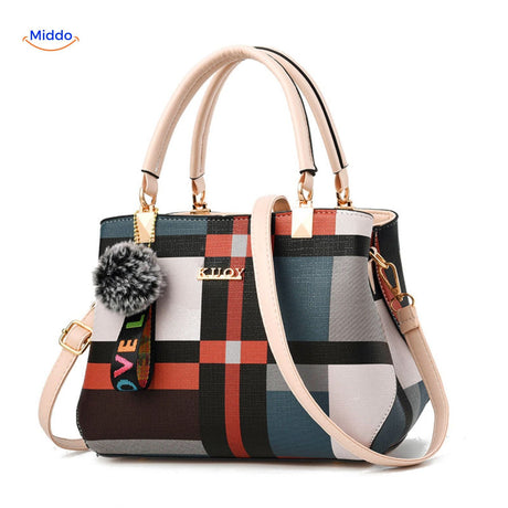 Stylish tote handbag with vibrant multicolor design pattern.