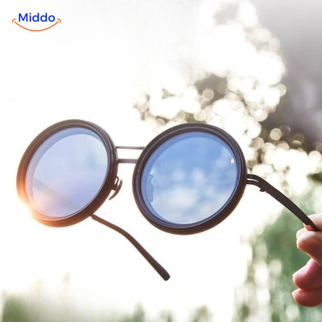 Premium sunglasses displaying quality UV lens with blue light reflection.