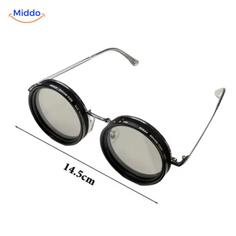 Sunglasses with clear lens and adaptive UV filter technology.